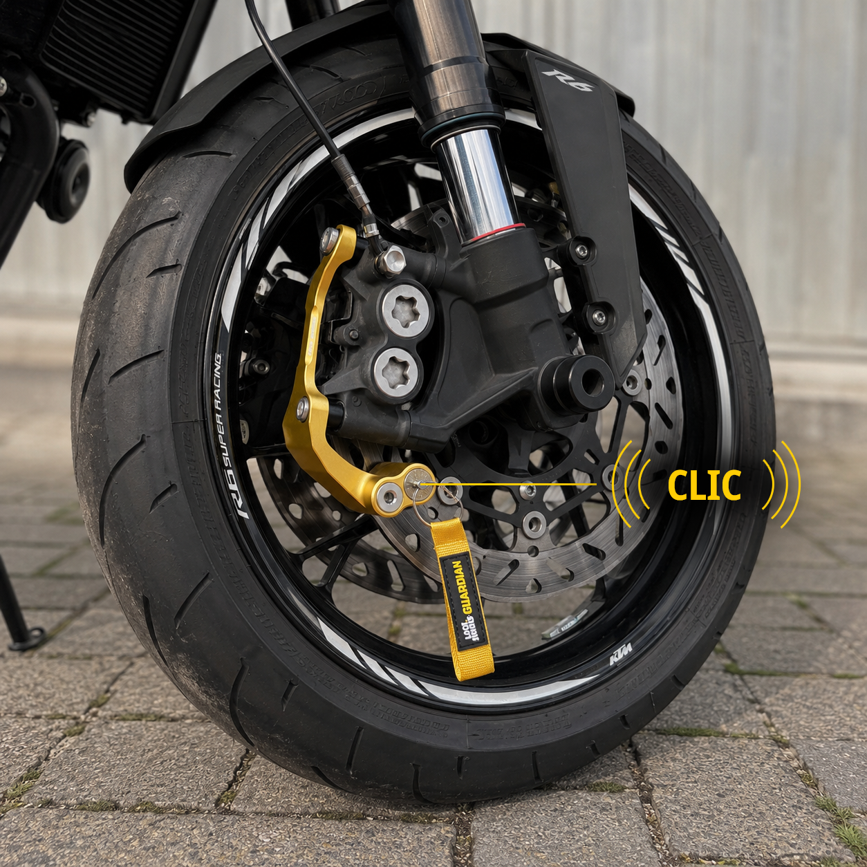 Lock Works Guardian inmovilizando la rueda delantera de una motocicleta