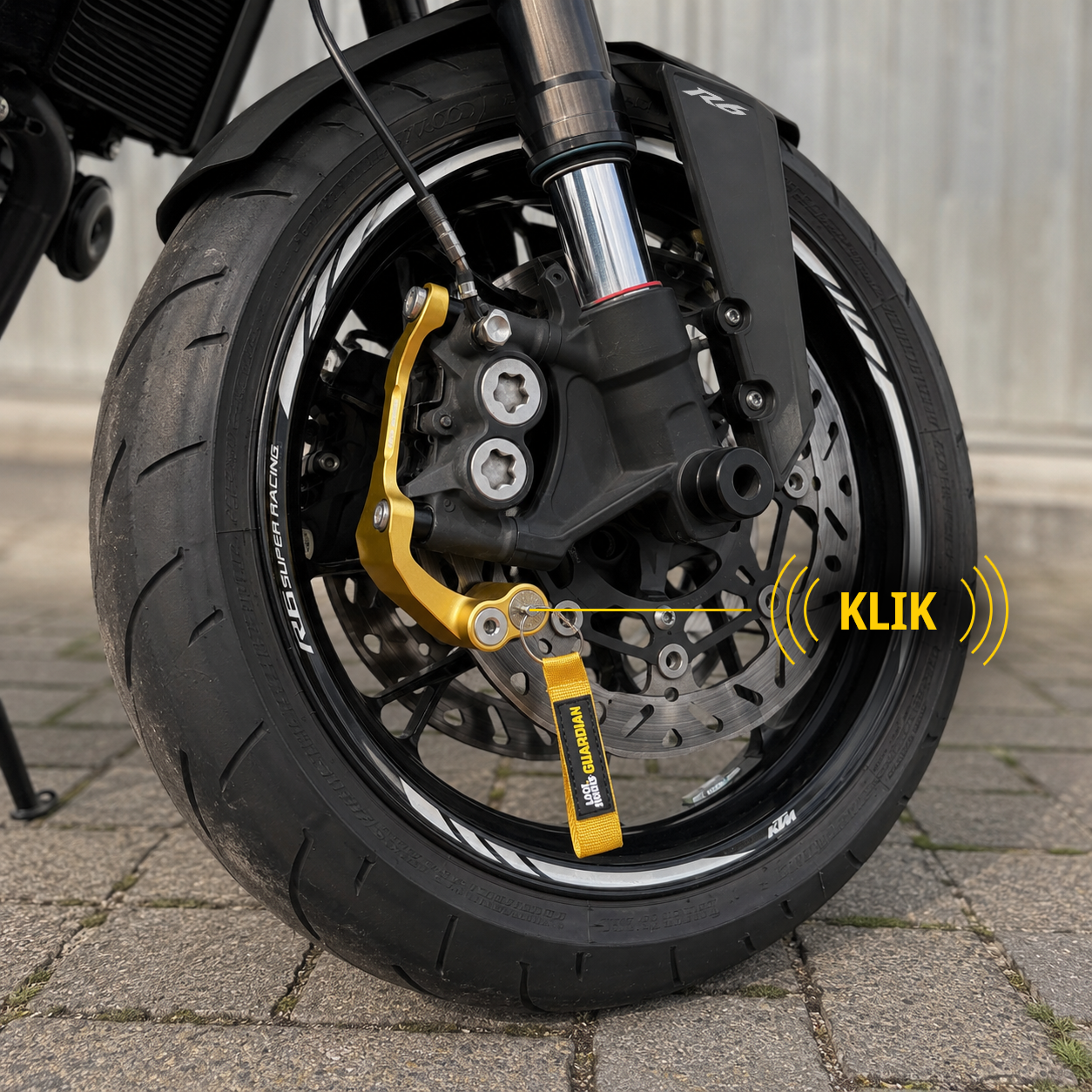 Lock Works Guardian die een voorwiel van een motor immobiliseert